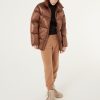 Super-padded puffy down jacket with high collar