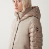 Down jacket in technical fabric with quilted sleeves - Image 3