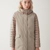 Down jacket in technical fabric with quilted sleeves