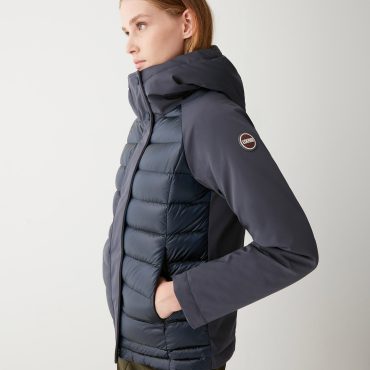 Quilted down jacket with technical fabric details