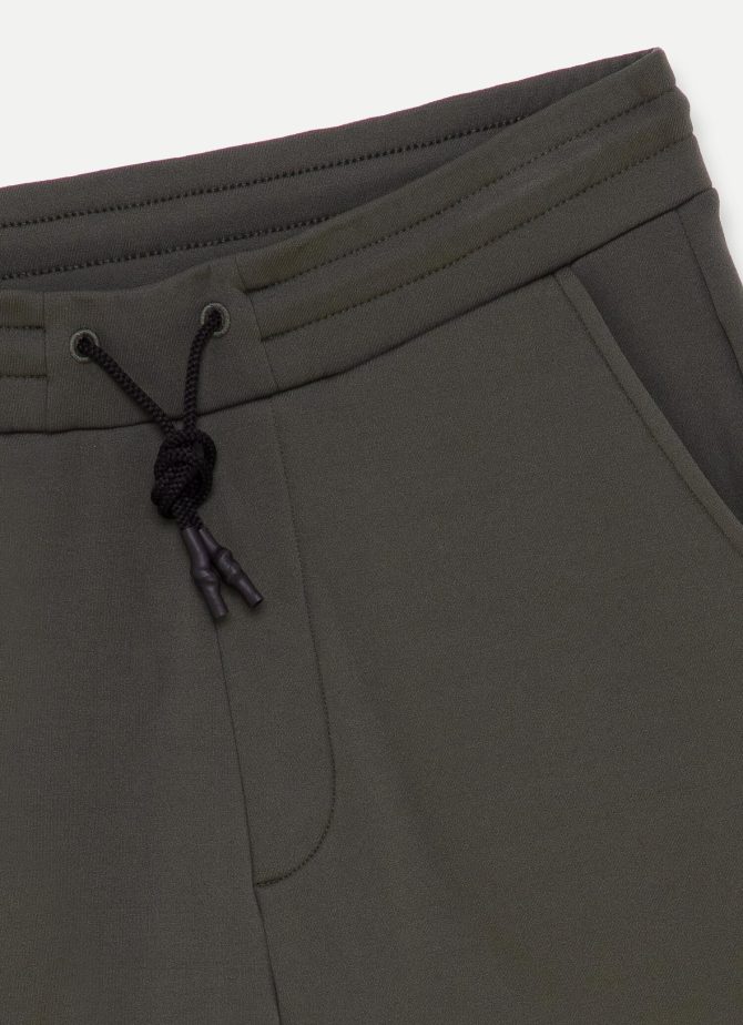 Sporty trousers in stretch fleece - Image 6