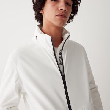 Softshell with foldaway hood