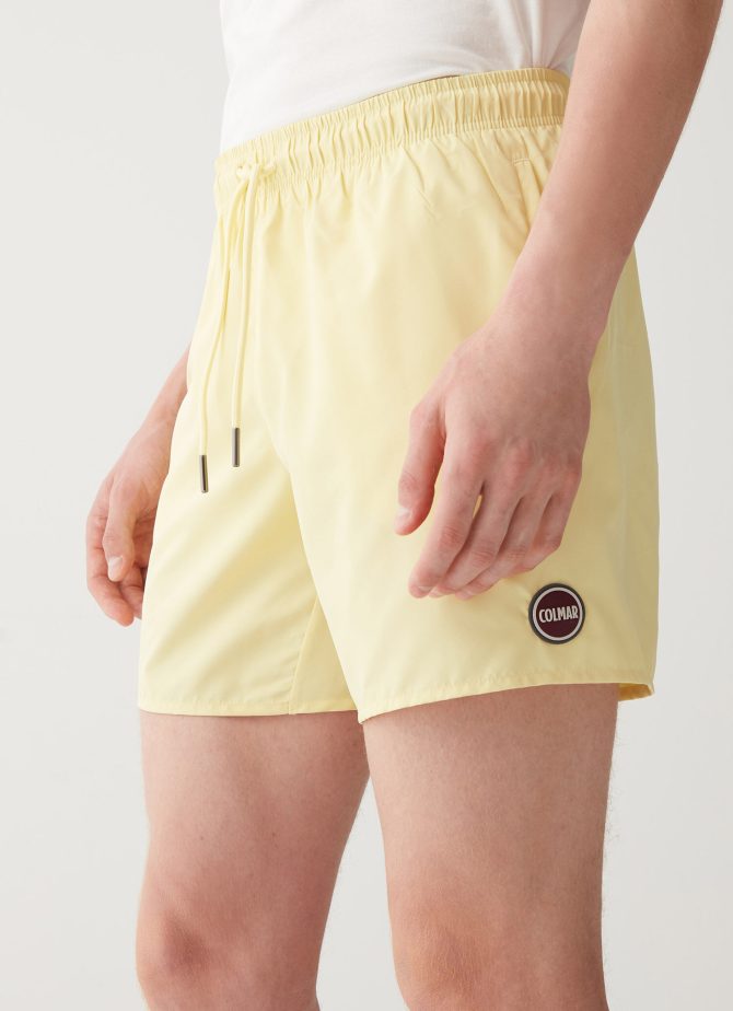 Solid colour swimsuit with elasticated waist
