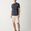 Dyed stretch piqué polo shirt