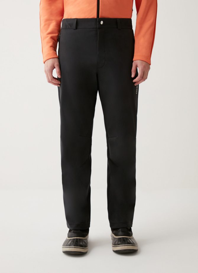 Trousers with drawstring hem