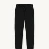 Trousers with drawstring and turn-ups - Image 4