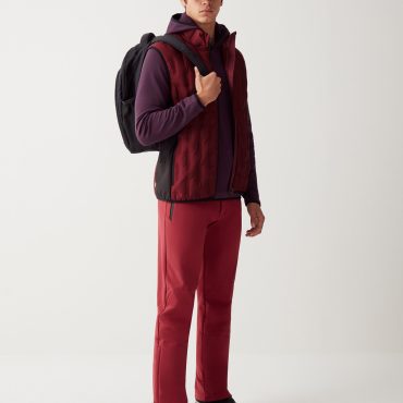 Down-padded gilet with softshell inserts