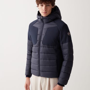 Down jacket with fixed hood in double fabric