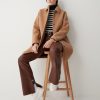Coat with shirt collar in wool cloth.