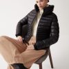 Down jacket with ribbed knit cuffs