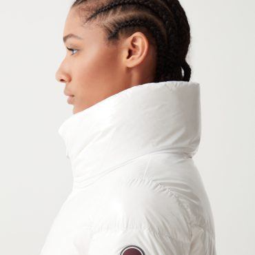 Down jacket with high collar in shiny fabric