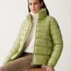 Down jacket with high collar and elasticated cuffs