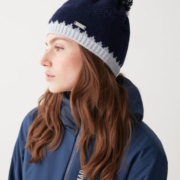 Hat with contrasting trim and pom-pom