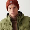 Unisex cap with maxi pompon