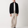 Full zip, high collar sweatshirt with side pockets