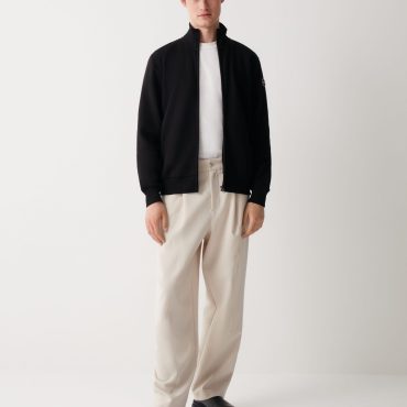 Full zip, high collar sweatshirt with side pockets