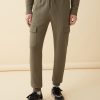 Tracksuit bottoms in cargo-style jersey - Image 3