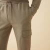 Tracksuit bottoms in cargo-style jersey - Image 2