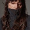 Polo-neck sweater with adjustable details