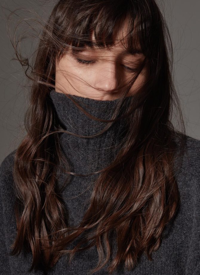 Polo-neck sweater with adjustable details